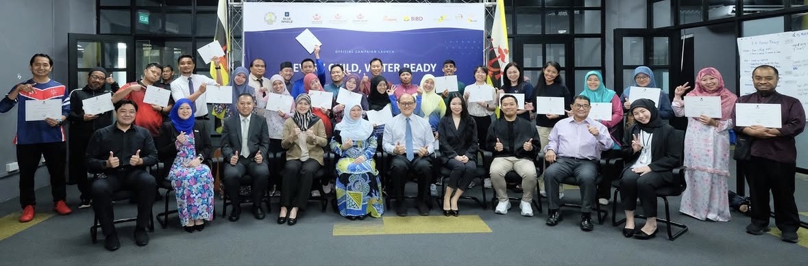 Educators from 13 Brunei schools holding their certificates after completing Blue Whale Water Safety teacher training
